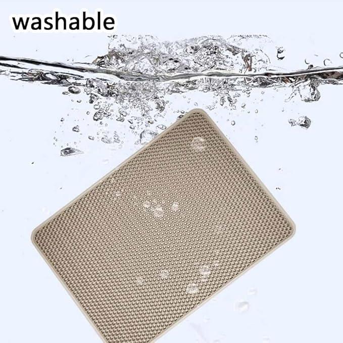 Washable pet mat with textured surface submerged in water for easy cleaning