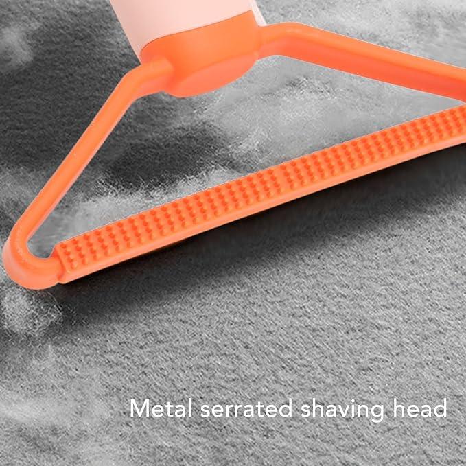 Orange pet hair remover with metal serrated shaving head on gray fabric