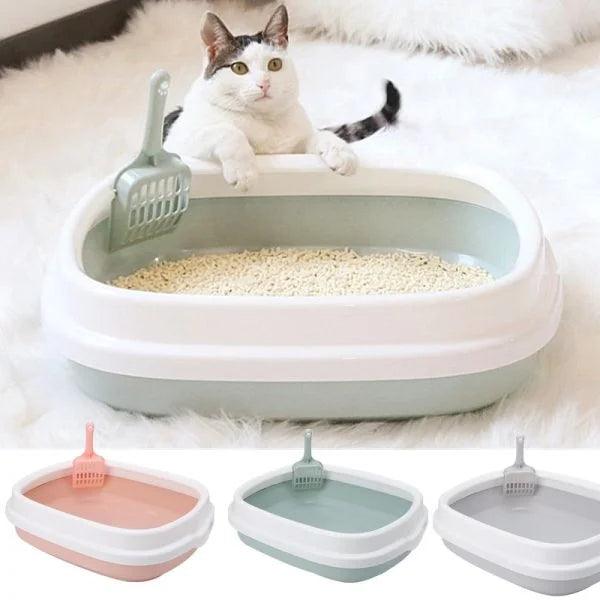 Cat in modern litter box with scoop, available in pink, mint, and gray — ideal for pet hygiene and comfort.