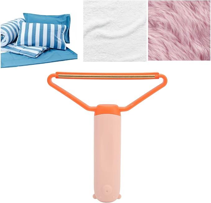 Orange pet hair remover tool with pink handle, ideal for grooming and cleaning pet fur from beds and fabrics
