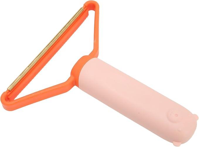 Pink and orange pet grooming brush with soft handle and metal teeth for shedding control