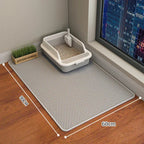 Gray cat litter mat with 90x60cm dimensions, placed under litter box near window, ideal for pet mess control.