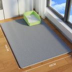 Grey cat litter mat with green litter box, 90x60cm, on wood floor by window